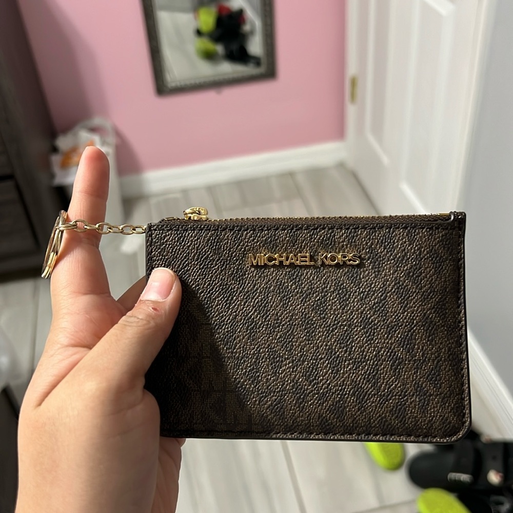 Small Michael kors coin purse/ key chain good to put in work/school id